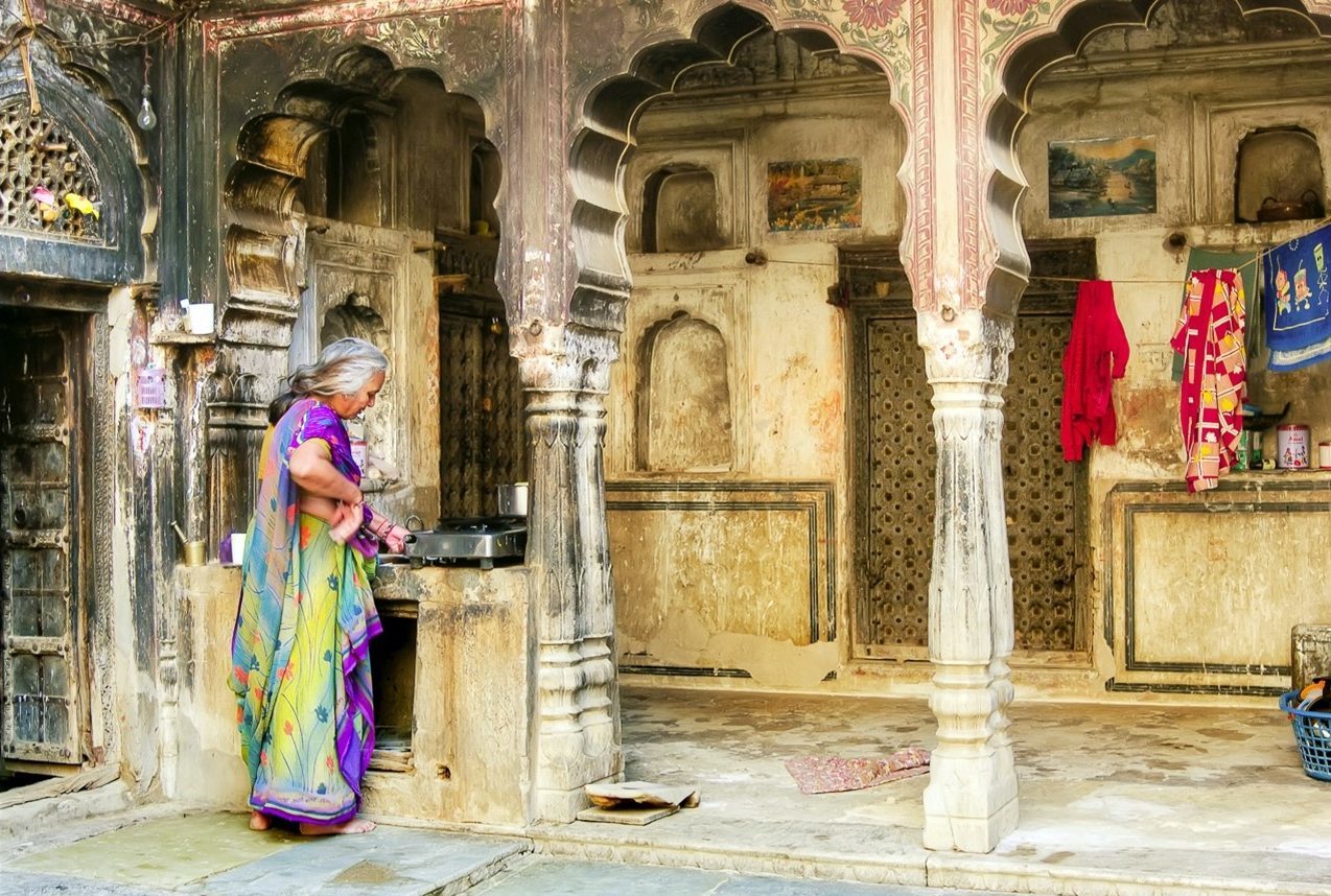 Woman cooking in Rajasthani Haveli